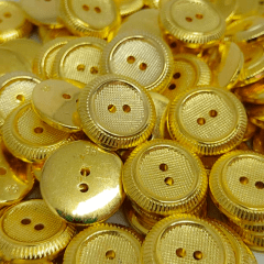 Botão Abs - Modinha - Bordas Trabalhadas - Dourado - 2 furos - Tam 28"/17,78mm - C/100und - CÓD AM11890